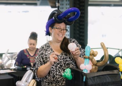 Balloon entertainment featured during the Brannan Companies picnic event in Denver, CO