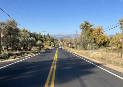Two-lane asphalt road part of the Brannan Companies project in Denver, CO