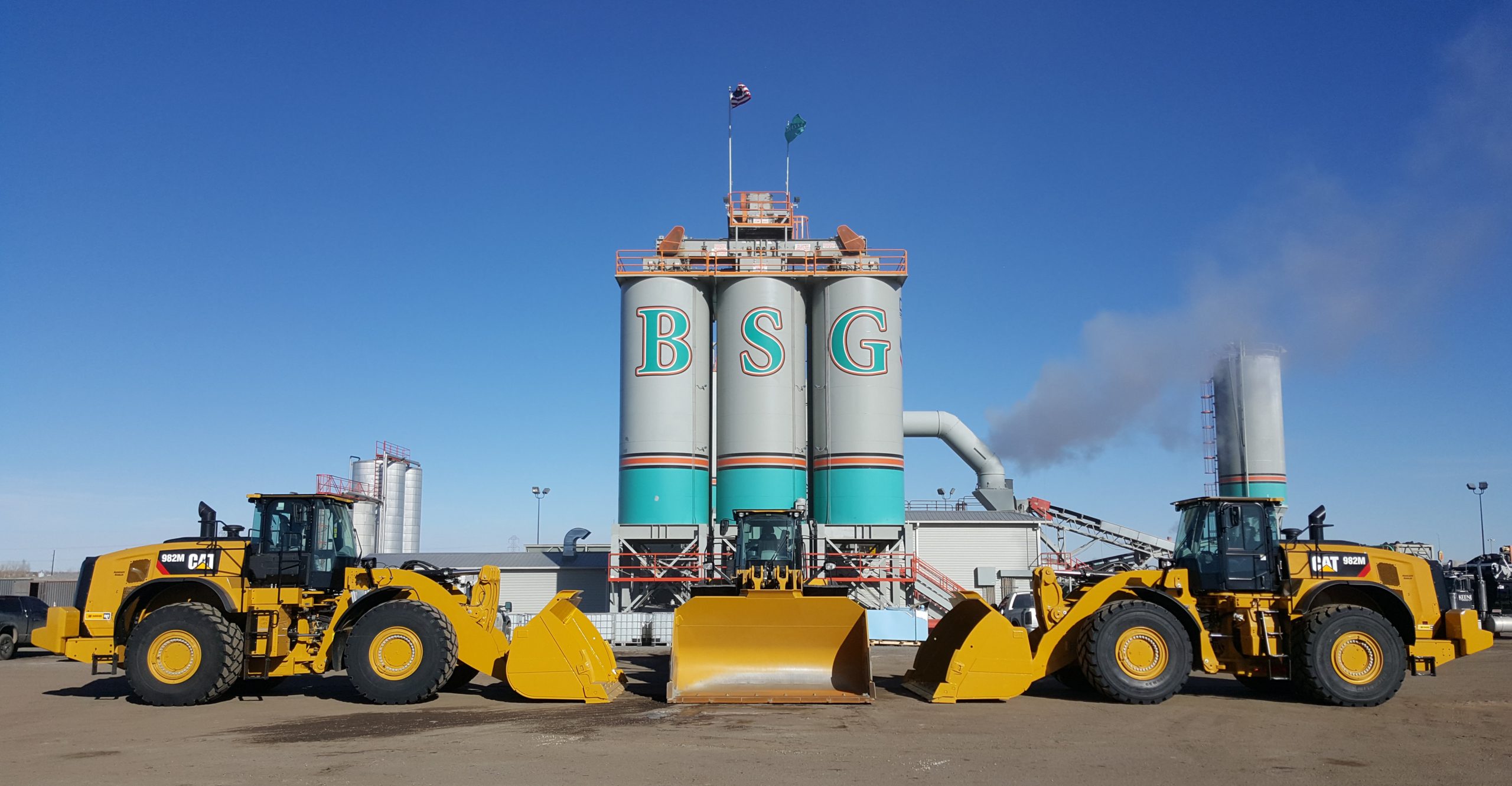 loaders2-scaled-1 Asphalt materials production and supply facility with heavy equipment in Denver, CO.
