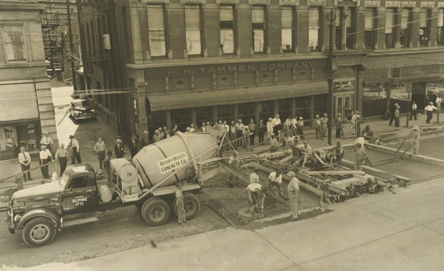 People Using Concrete Truck to Do Construction Work 