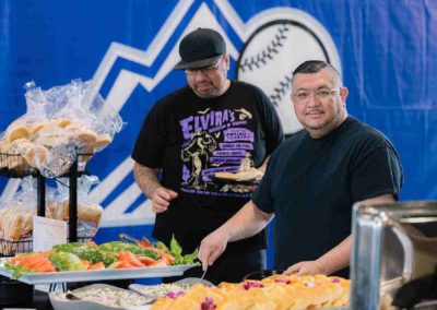 Company team serving meals at the Brannan Company Picnic 2025 event in Denver, CO.